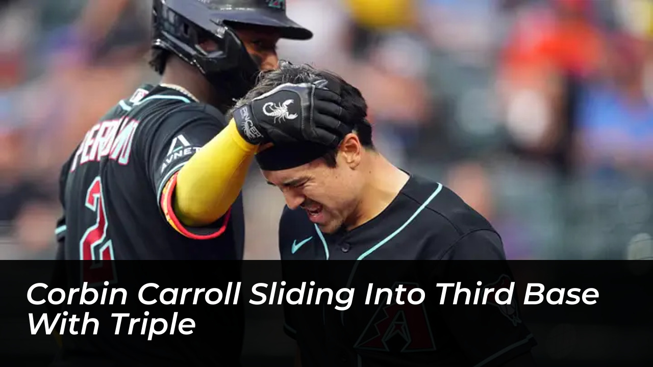 Corbin Carroll sliding into third base with triple